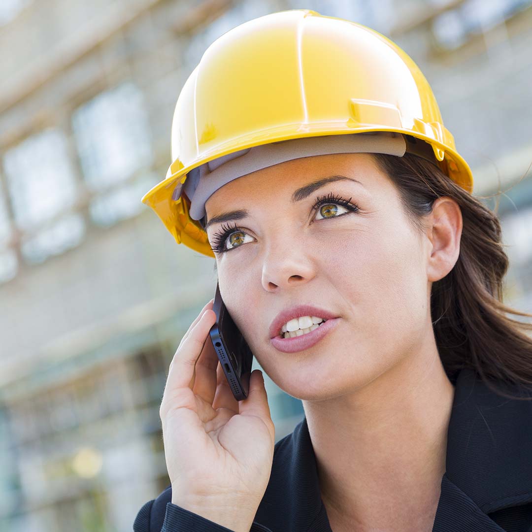 A female contractor on the phone